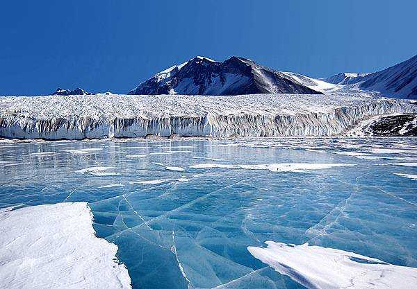 The blue ice covering Lake Fryxell, in the Transantarctic Mountains, comes from glacial meltwater from the Canada Glacier and other smaller glaciers. Image courtesy of National Science Foundation.